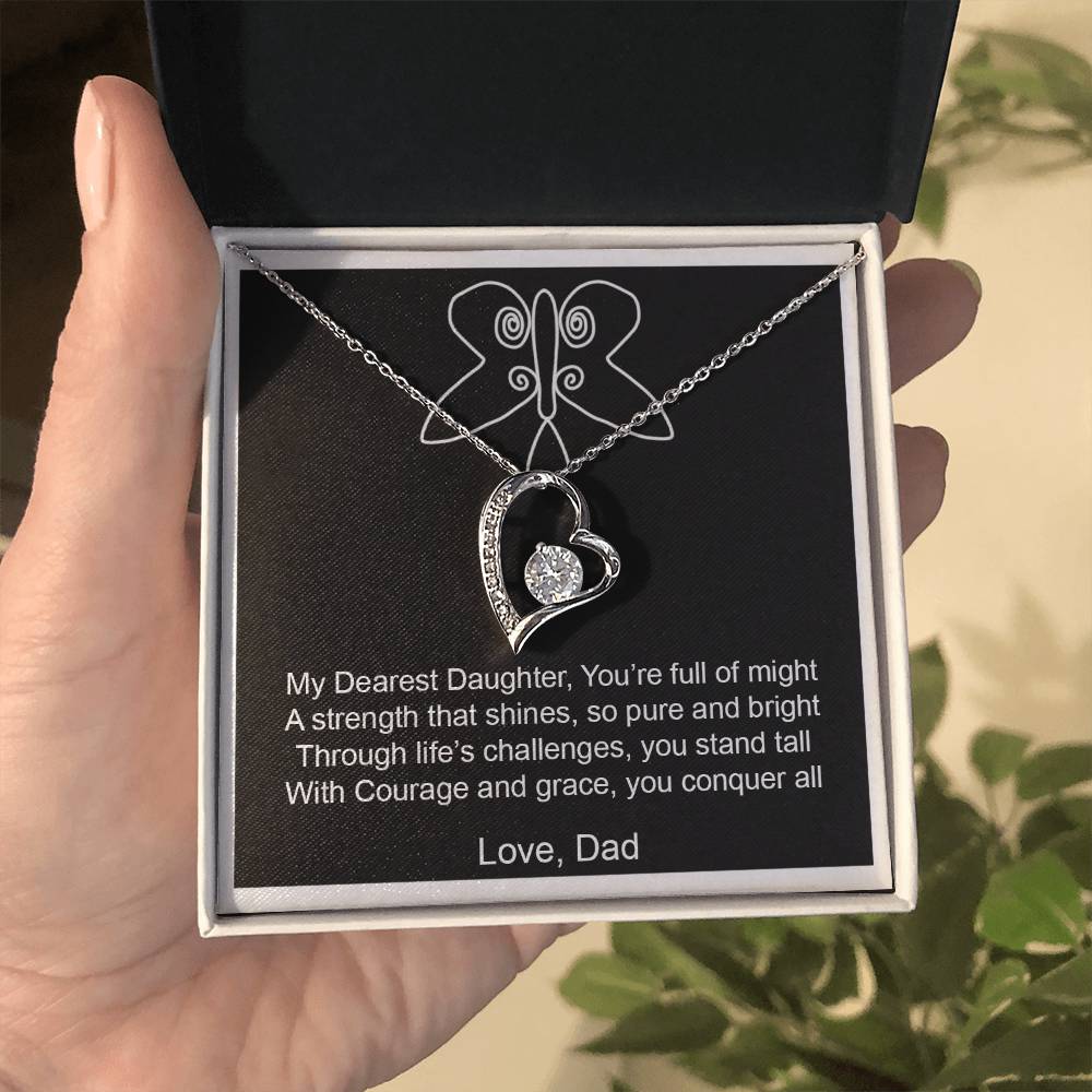 heart necklace on a message card